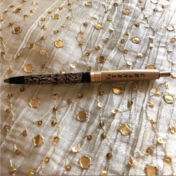 14K gold filigree pen.